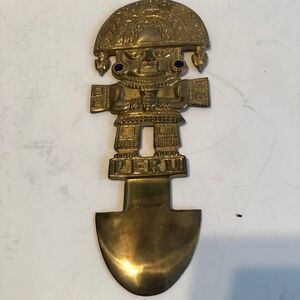 Vintage brass wall hanging featuring the fertility god Made in Peru,